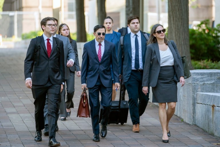 U.S. Department of Justice lawyers, including Kenneth Dintzer, center, and Megan Bellshaw, right, arrive at the E. Barrett Prettyman U.S. Federal Courthouse, Tuesday, Sept. 12, 2023, in Washington. Google will confront a threat to its dominant search engine beginning Tuesday when federal regulators launch an attempt to dismantle its internet empire in the biggest U.S. antitrust trial in a quarter century.