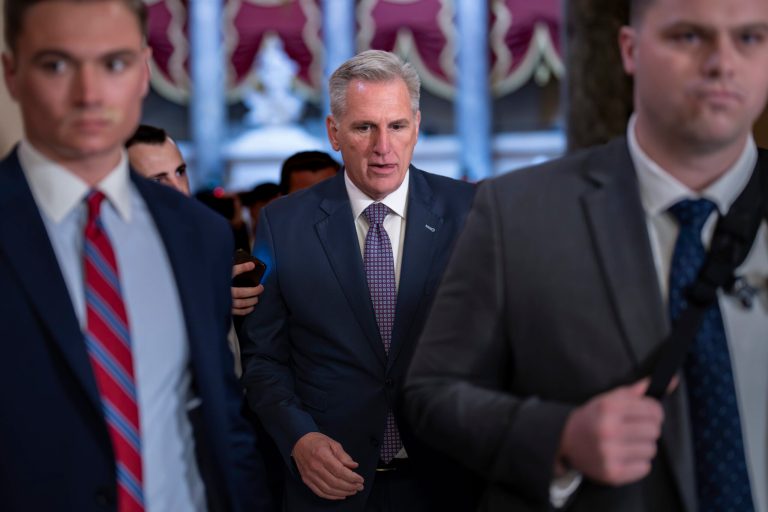 Speaker of the House Kevin McCarthy (R-CA) heads to the chamber at the Capitol in Washington on Sept. 18, 2023. McCarthy is trying to win support from right-wing Republicans by including spending cuts and conservative proposals for border security and immigration.