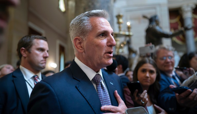 Speaker of the House Kevin McCarthy (R-CA) stops for reporters' questions about passing a funding bill and avoiding a government shutdown at the Capitol on Sept. 18, 2023.
