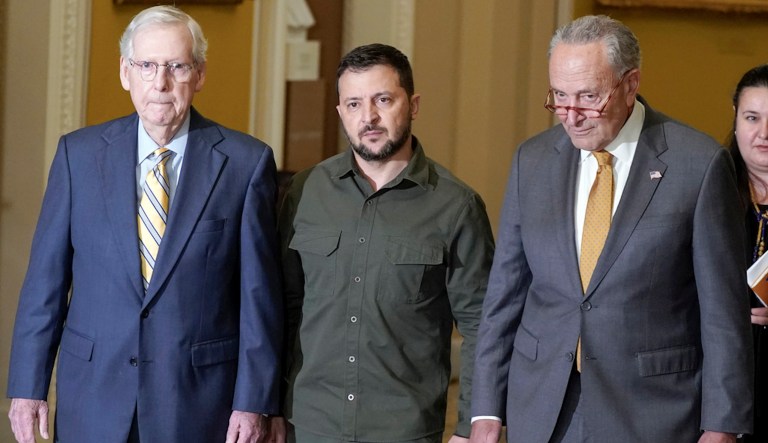 Ukrainian President Volodymyr Zelensky, center, walks with Senate Minority Leader Mitch McConnell (R-KY), left, and Senate Majority Leader Chuck Schumer (D-NY), right, at Capitol Hill on Thursday, Sept. 21, 2023, in Washington.