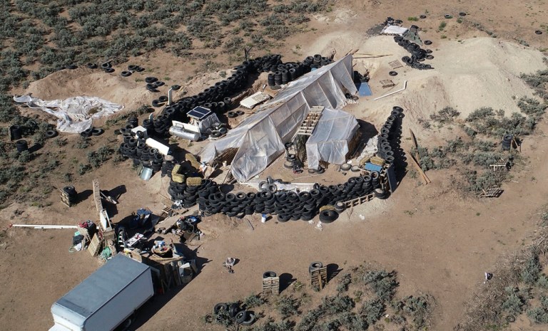 A ramshackle compound is seen in the desert area of Amalia, New Mexico, on Aug. 10, 2018. 