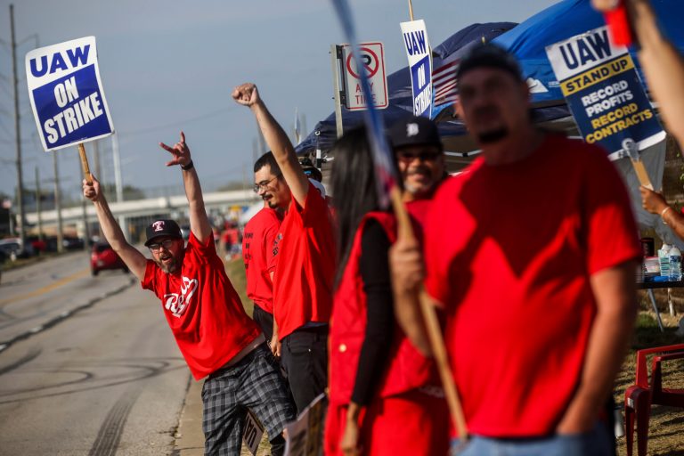 United Auto Workers members line Stickney Avenue while holding the picket line outside Stellantis Toledo Assembly Complex on Saturday, Sept. 23, 2023, in Toledo, Ohio. 