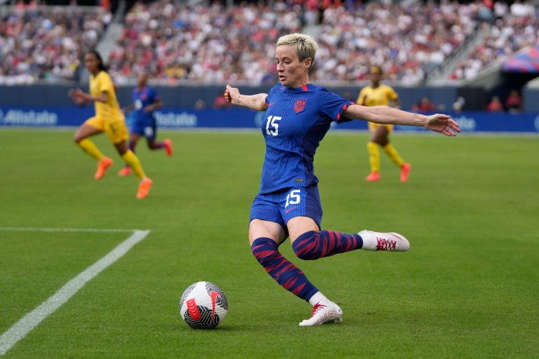United States forward Megan Rapinoe passes the ball during the first half of a soccer game against South Africa, Sunday, Sept. 24, 2023, in Chicago.