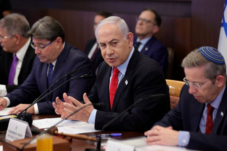 Israeli Prime Minister Benjamin Netanyahu, center, attends the weekly Cabinet meeting at the prime minister's office in Jerusalem on Wednesday, Sept. 27, 2023.