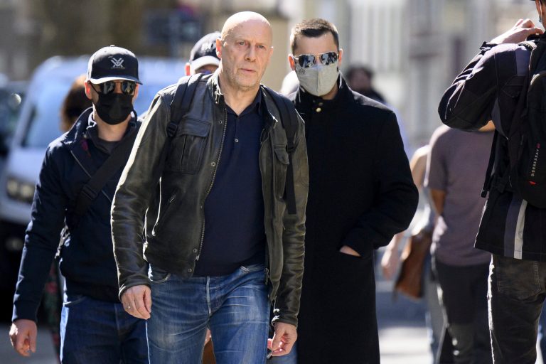 French-Swiss far-right writer Alain Soral, left, arrives at the courthouse for his appeal trial for homophobia against a journalist, in Lausanne, Switzerland, Wednesday, September 27, 2023. The court ruled that Swiss-French essayist Alain Soral must spend 60-day in prison over a case of discrimination, defamation and incitation to hatred for deriding a newspaper journalist as a âfat lesbian.â 