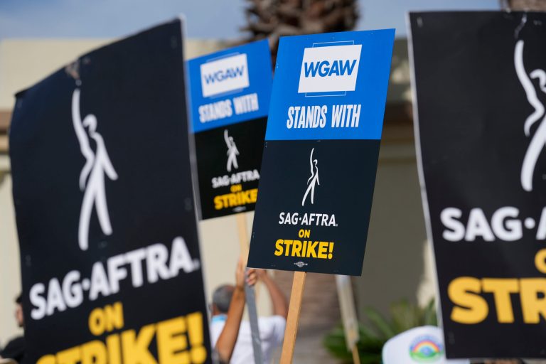 FILE - Picketers demonstrate outside Paramount Pictures studio on Wednesday, Sept. 27, 2023, in Los Angeles. (AP Photo/Chris Pizzello, File)