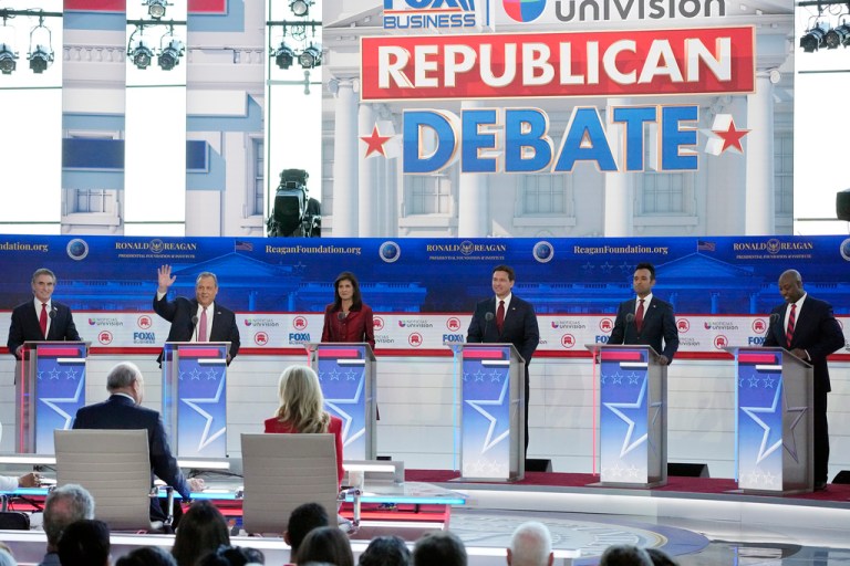 Republican presidential candidates stand at their podiums during a Republican presidential primary debate Sept. 27, 2023.
