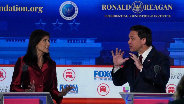 Former U.N. Ambassador Nikki Haley, left, argues a point with Gov. Ron DeSantis (R-FL) during a Republican presidential primary debate hosted by Fox Business and Univision, Wednesday, Sept. 27, 2023, at the Ronald Reagan Presidential Library in Simi Valley, California.