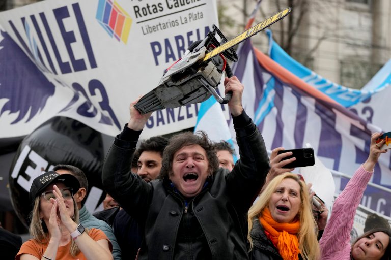 FILE - Presidential hopeful of the Liberty Advances coalition Javier Milei brandishes a chainsaw during a rally in La Plata, Argentina, Tuesday, Sept. 12, 2023. During campaign stops and interviews Milei has hurled abuse against ArgentinaÂ´s political class, leftist Latin American presidents such as MexicoÂ´s Andres Lopez Obrador, journalists, and Pope Francis. (AP Photo/Natacha Pisarenko, File)