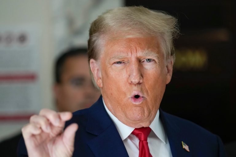 Former President Donald Trump speaks to the media during a break in his civil business fraud trial at New York Supreme Court, Tuesday, Oct. 3, 2023, in New York.