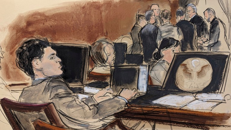 In this courtroom sketch, FTX founder Sam Bankman-Fried, foreground, sits at the defense table while Judge Lewis Kaplan and attorneys discuss final jury selection in his trial, Wednesday, Oct. 4, 2023, in New York.