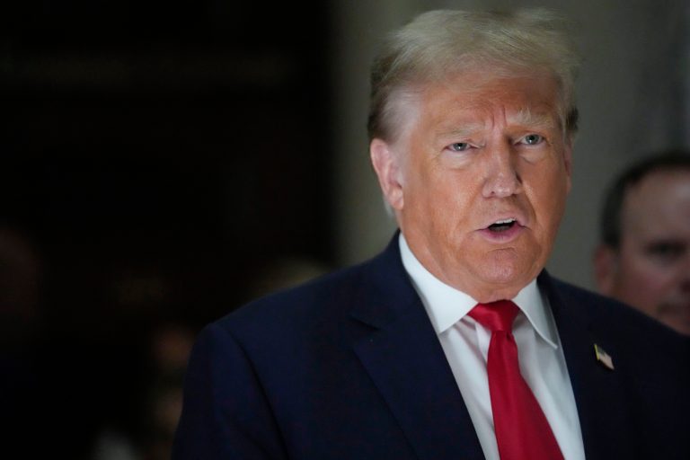 Former President Donald Trump speaks to reporters as he leaves the courtroom during a lunch break in his civil business fraud trial, Oct. 4, 2023, in New York. Trump's lawyers have asked a judge to postpone his Florida classified documents trial until after next yearâs presidential election. The lawyers say they have not received all the records they need to prepare Trump's defense.