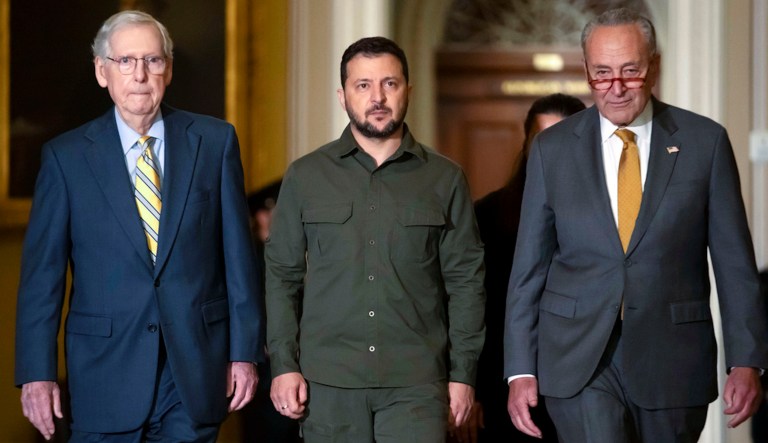 Ukrainian President Volodymyr Zelensky, center, walks with Senate Minority Leader Mitch McConnell (R-KY), left, and Senate Majority Leader Chuck Schumer (D-NY), right, at Capitol Hill on Thursday, Sept. 21, 2023, in Washington.