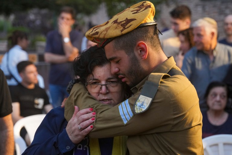 Friends and relatives of Ilai Bar Sade mourn during his funeral at the military cemetery in Tel Aviv, Israel, on Oct. 9, 2023. Bar Sade was killed after Hamas militants stormed from the blockaded Gaza Strip into nearby Israeli towns. 
