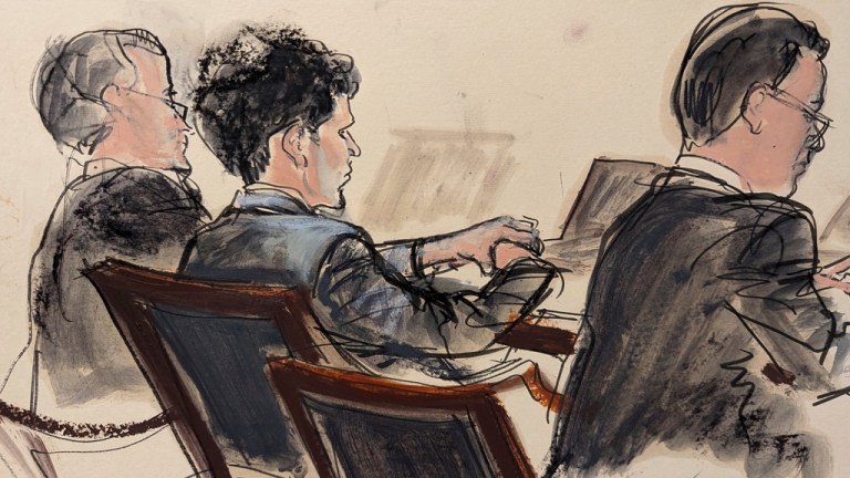 FTX founder Sam Bankman-Fried, center, flanked by his attorneys, Tuesday, Oct. 10, 2023, at Manhattan federal court in New York.