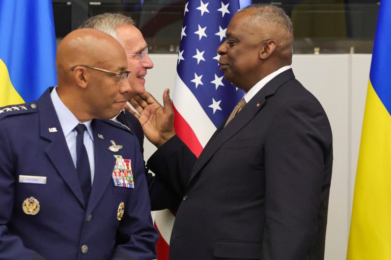 United States Secretary of Defense Lloyd Austin, right, greets NATO Secretary-General Jens Stoltenberg, center, prior to a meeting of the Ukraine Defense Contact Group at a meeting of NATO defense ministers at NATO headquarters in Brussels, Wednesday, Oct. 11, 2023. Ukraine's President Volodymyr Zelensky has arrived at NATO for meetings with alliance defense ministers to further drum up support for Ukraine's fight against Russia.