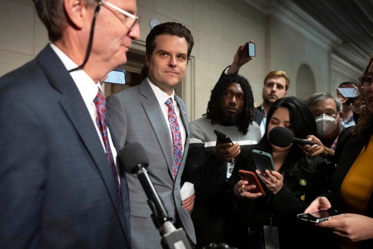 Rep. Matt Gaetz (R-FL), right, listens as Rep. Tim Burchett (R-TN) speaks to reporters after a closed-door meeting of House Republicans, Wednesday, Oct. 11, 2023 in Washington.