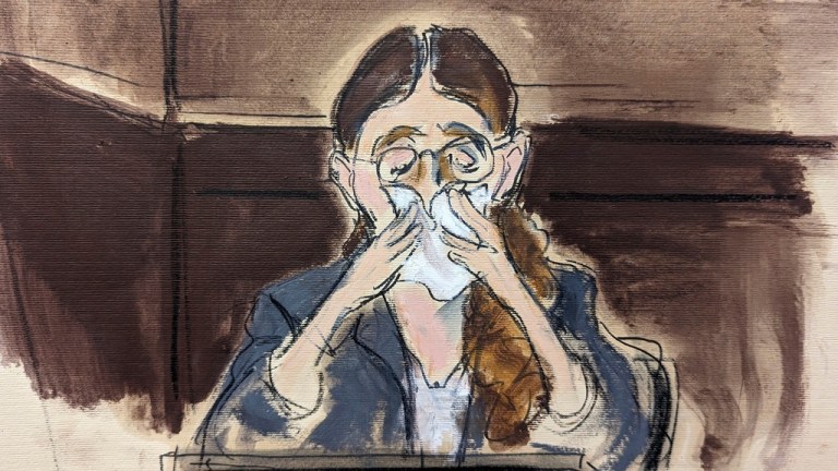 In  this courtroom sketch, Caroline Ellison weeps as she testifies during FTX founder Sam Bankman-Fried's trial in Manhattan federal court, Wednesday, Oct. 11, 2023, in New York. 