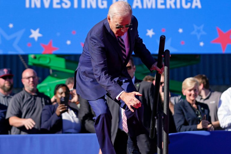 Joe Biden stumbles up the stairs to speak in Philadelphia