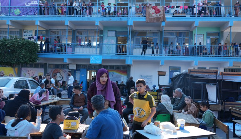 Palestinians take shelter in a U.N.-run school from the ongoing Israeli strikes on the Gaza Strip in Nuiserat refugee camp on Saturday, Oct. 14, 2023. 