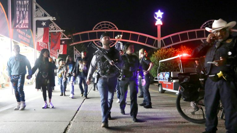 Dallas Police officers work near the scene of a shooting at the State Fair of Texas on Saturday, Oct. 14, 2023, in Dallas.