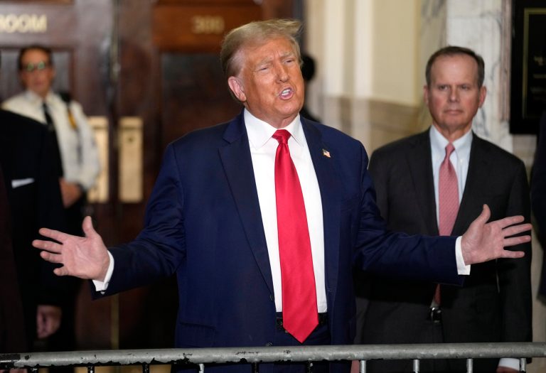 Former President Donald Trump arrives for his civil business fraud trial at the New York Supreme Court on Tuesday, Oct. 17, 2023.