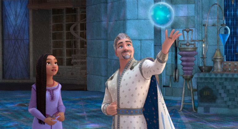 This image released by Disney shows Asha, voiced by Ariana DeBose, left, and King Magnifico, voiced by Chris Pine, in a scene from the animated film Wish.