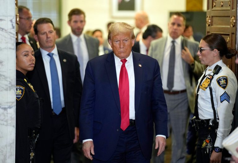 Former President Donald Trump leaves the courtroom at lunch break in his civil business fraud trial at New York Supreme Court, Tuesday, Oct. 17, 2023, in New York.
