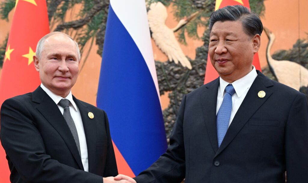 Chinese President Xi Jinping, right, and Russian President Vladimir Putin pose for a photo prior to their talks on the sidelines of the Belt and Road Forum in Beijing, China, on Wednesday, Oct. 18, 2023.