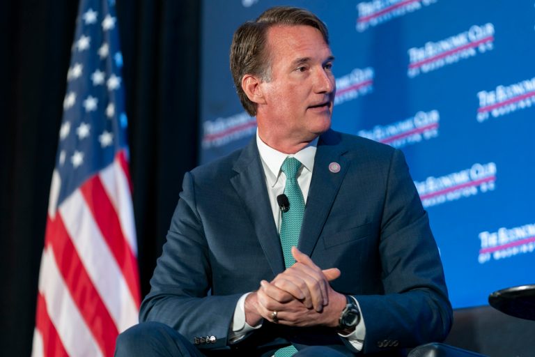 FILE - Republican Virginia Gov. Glenn Youngkin speaks to David Rubenstein during an interview hosted by the Economic Club of Washington, Sept. 26, 2023, in Washington. (AP Photo/Stephanie Scarbrough, File)