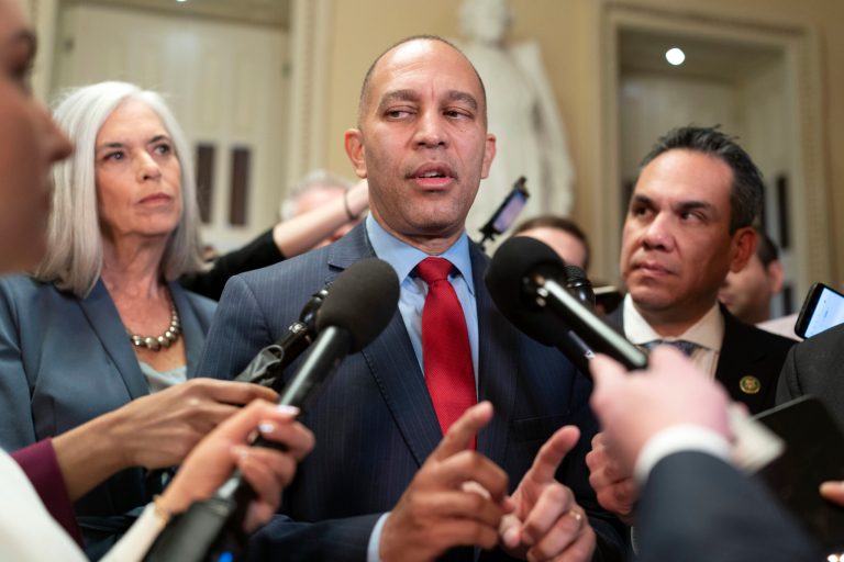 House Minority Leader Hakeem Jeffries (D-NY), accompanied by Democratic Whip Rep. Katherine Clark (D-MA) and Democratic Caucus Chair Rep. Pete Aguilar (D-CA), talks to reporters Friday, Oct. 20, 2023, before walking to the House chamber at the Capitol in Washington.
