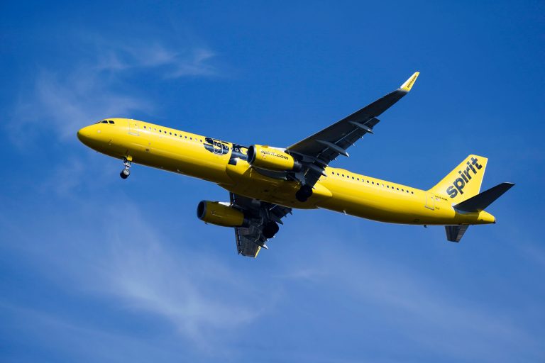 FILE - A Spirit Airlines jet approaches Philadelphia International Airport in Philadelphia, Feb. 24, 2021. (AP Photo/Matt Rourke, File)