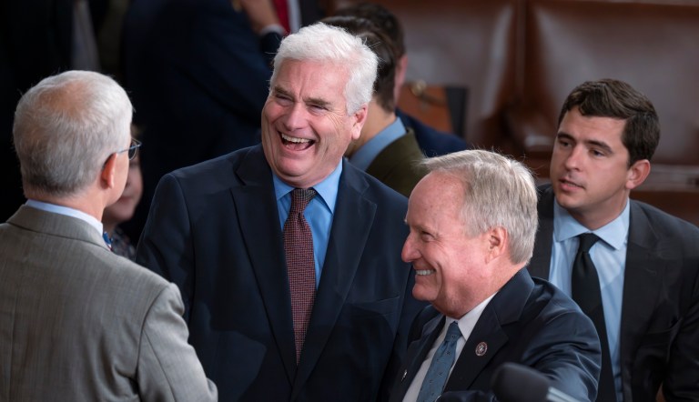 House Majority Whip Tom Emmer (R-MN), center, is flanked by Rep. Patrick McHenry (R-NC), the temporary leader of the House of Representatives, left, and Rep. David Joyce (R-OH), right, as lawmakers convene to hold a third ballot to elect a speaker of the House, at the Capitol in Washington, Friday, Oct. 20, 2023.