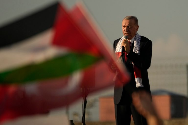 Turkish President Recep Tayyip Erdogan speaks to the attendees during a rally to show their solidarity with the Palestinians, in Istanbul, Turkey, Saturday, Oct. 28, 2023.