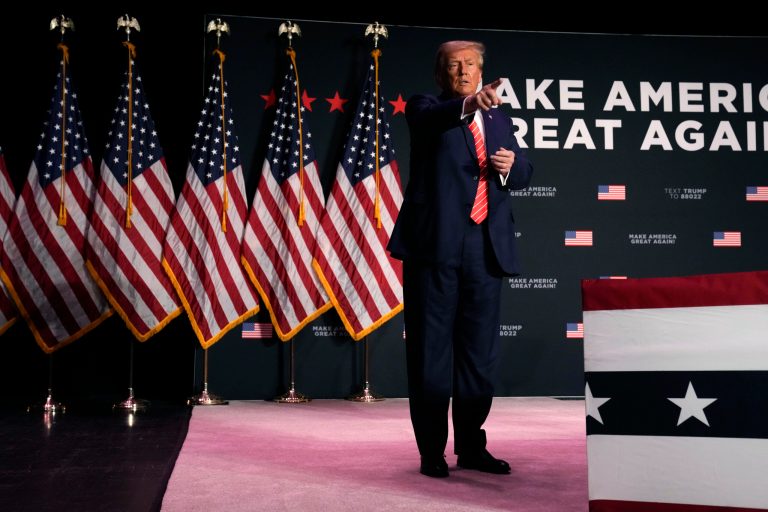 Former President Donald Trump walks off stage after a commit to caucus rally, Sunday, Oct. 29, 2023, in Sioux City, Iowa.