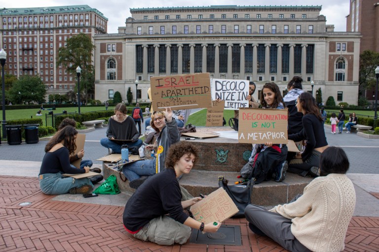 Demonstrators gather with signs near the Butler Library on the Columbia University campus in the Morningside Heights neighborhood of New York City on Sunday, October 8, 2023. 