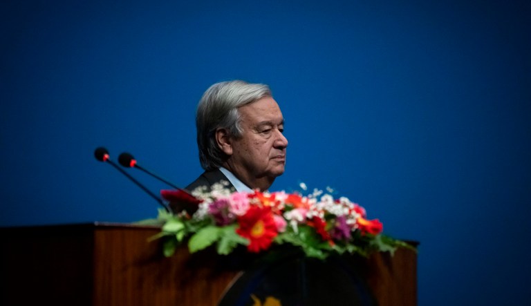 U.N. Secretary-General Antonio Guterres stands for the national anthem before he addresses the Nepalese Parliament in Kathmandu, Nepal, Tuesday, Oct. 31, 2023.