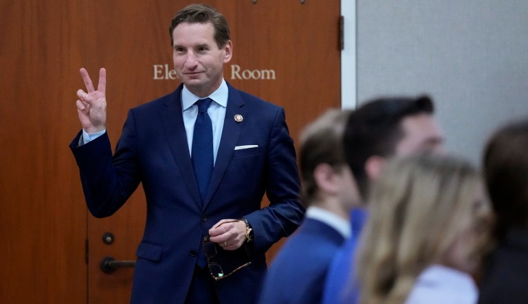Democratic presidential candidate Rep. Dean Phillips (D-MN) acknowledges a guest in the audience during a campaign stop, Tuesday, Oct. 31, 2023, in Manchester, New Hampshire.