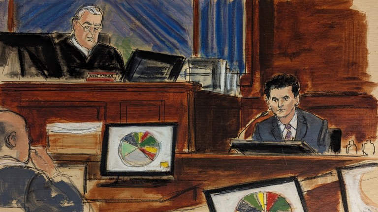 In this courtroom sketch, FTX founder Sam Bankman-Fried, right, testifies as Judge Lewis Kaplan, upper left, presides during Bankman-Fried's trial in Manhattan federal court, Tuesday, Oct. 31, 2023, in New York. 