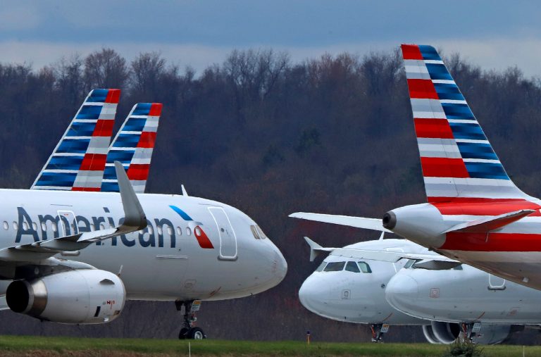 American Airlines planes sit stored at Pittsburgh International Airport on March 31, 2020, in Imperial, Pennsylvania.