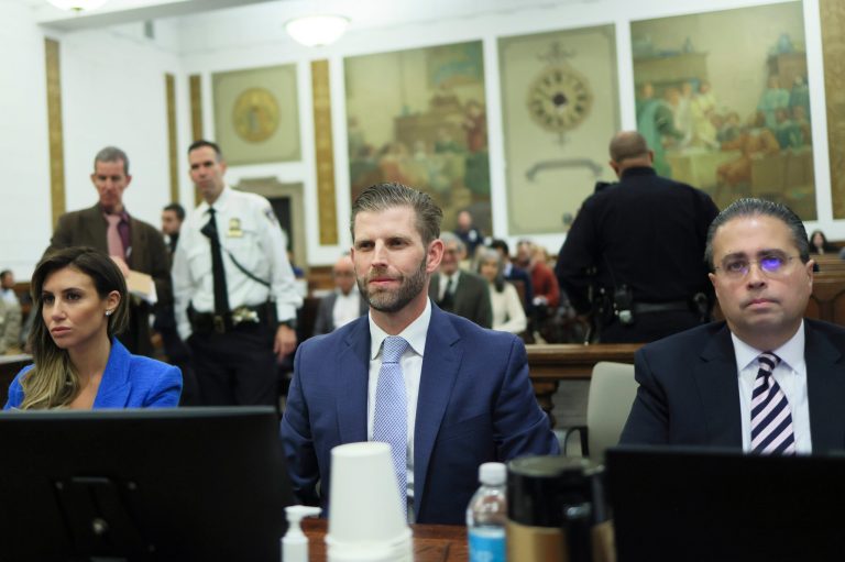Eric Trump, center, appears at the fraud trial for his father, former President Donald Trump, at New York Supreme Court, Thursday, Nov. 2, 2023.