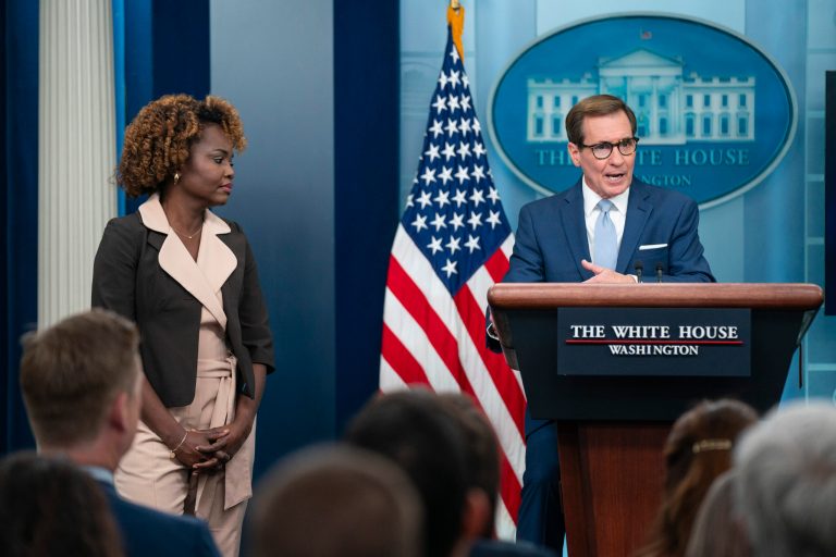 White House press secretary Karine Jean-Pierre listens as National Security Council spokesman John Kirby speaks Nov. 2, 2023.