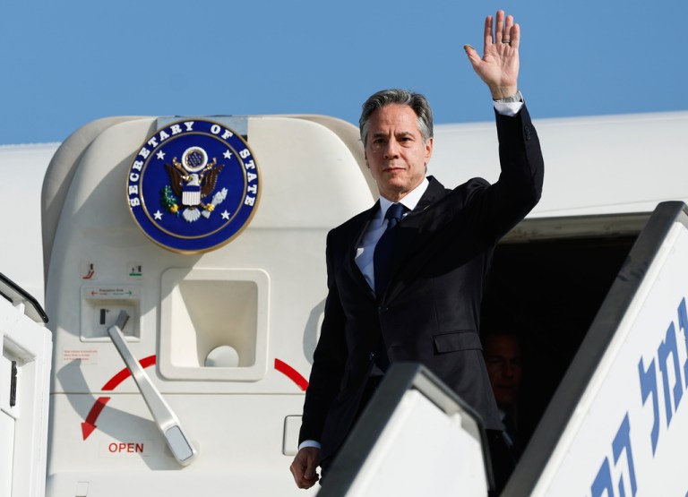 U.S. Secretary of State Antony Blinken waves as he disembarks from an aircraft on his arrival in Tel Aviv, Israel, Friday, Nov. 3, 2023.