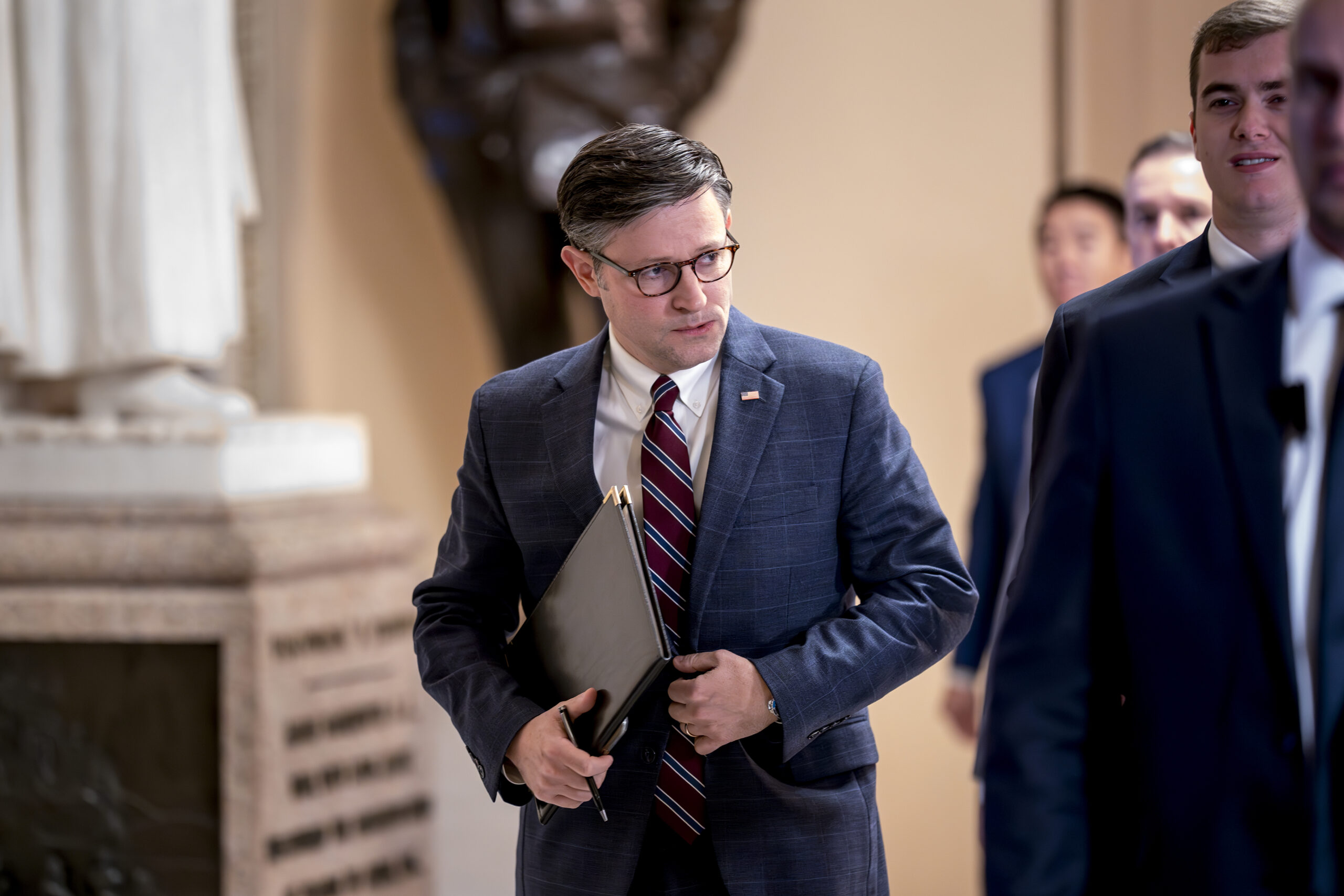 Johnson makes slow progress to avoid government shutdown in first full week as speaker