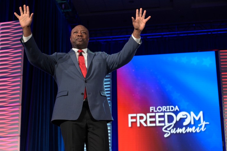Republican presidential candidate Sen. Tim Scott, R-S.C., acknowledges attendees after speaking at the Republican Party of Florida Freedom Summit, Saturday, Nov. 4, 2023, in Kissimmee, Fla.