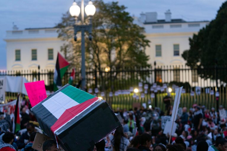 Anti-war activists carrying a mock coffin protest outside of the White House during a pro-Palestinian demonstration asking for a ceasefire in Gaza in Washington, Saturday, Nov. 4, 2023. 