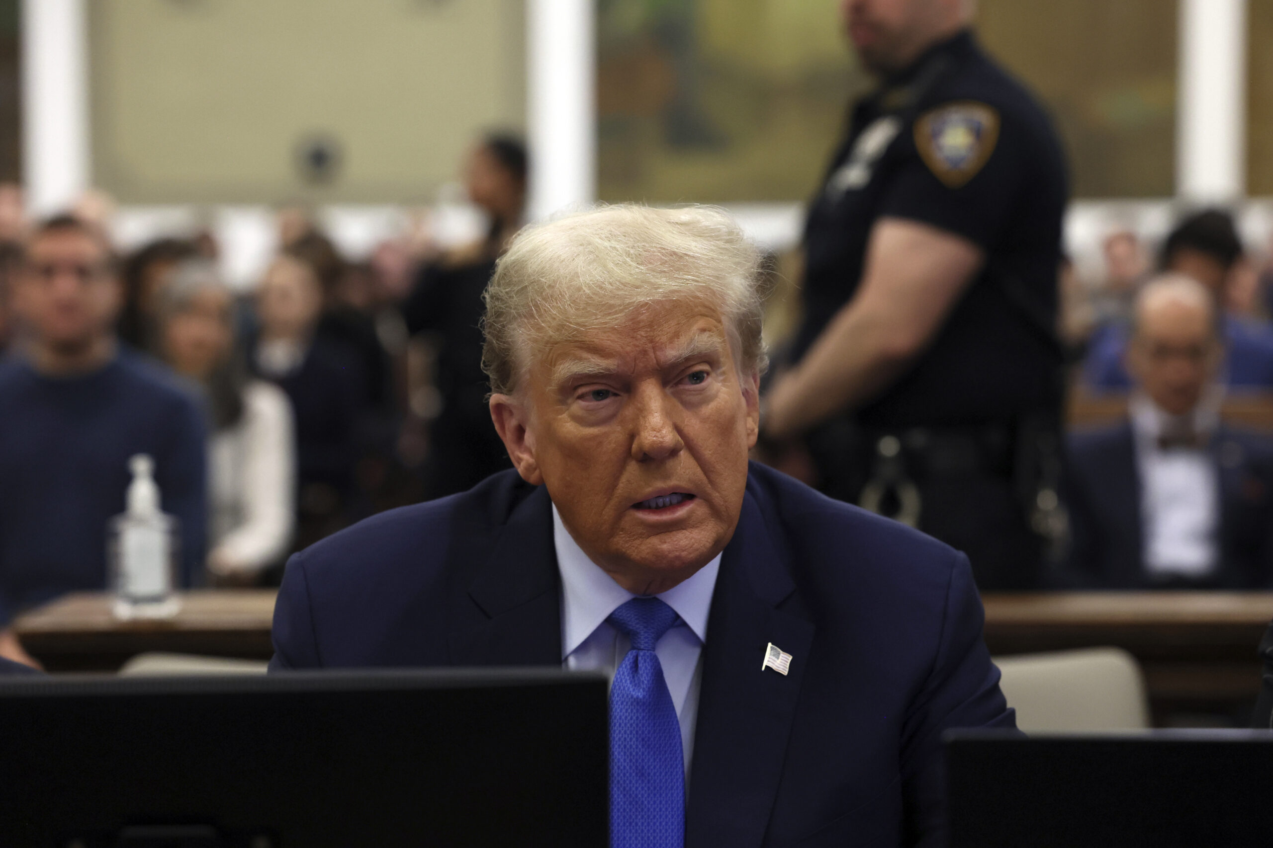 Trump can remain on Colorado primary ballot after 14th Amendment challenge, judge rules