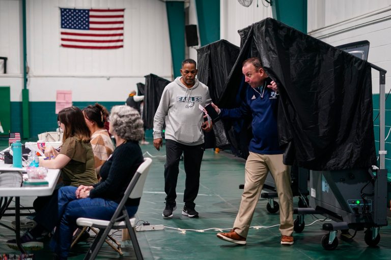 Voters step from booths after casting their ballots on election day in Philadelphia, Tuesday, Nov. 7, 2023.