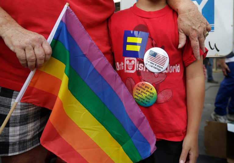 Participants join a celebration rally in Jackson Square in New Orleans on Wednesday, June 26, 2013.