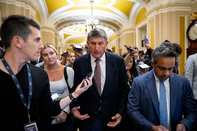 Sen. Joe Manchin (D-WV) speaks to reporters as he walks out of a closed-door caucus meeting after the House approved a 45-day funding bill to keep federal agencies open, Sept. 30, 2023, in Washington. Manchin announced he won't seek reelection in 2024, giving Republicans a prime opportunity to gain a seat in the heavily GOP state. 